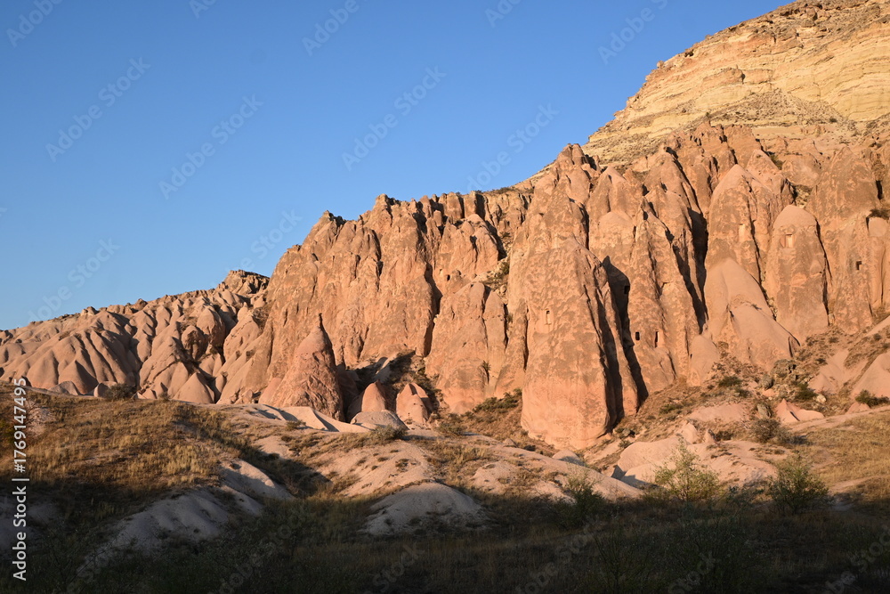 Fototapeta premium Volcanic Rock Formations and Cave Houses in Cappadocia, Turkey
