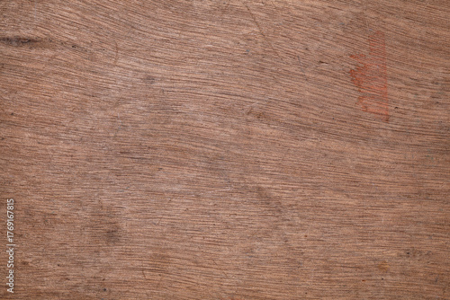 Wooden crate surface with paint stains and wear marks
