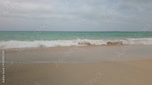 Atlantic Ocean waves breaking on the shoreline of the Cape Verde island of Boa Vista.