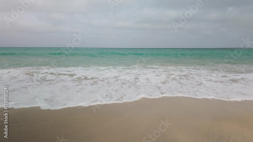 Atlantic Ocean waves breaking on the shoreline of the Cape Verde island of Boa Vista.