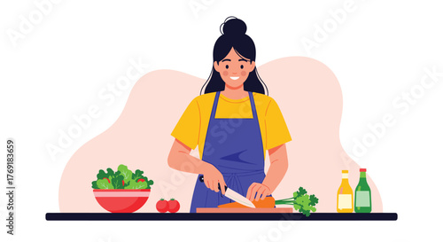 A cheerful woman in an apron smiles while dicing a carrot on a cutting board, preparing fresh vegetables for a healthy meal.