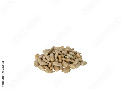 Peeled sunflower seeds isolated on white background.