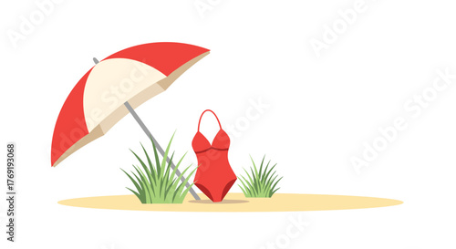 A vibrant red and beige beach umbrella provides shade for a matching red one-piece swimsuit on a sandy patch with green grass, ideal for summer.