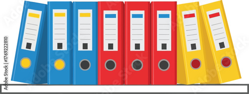 Organized colorful binders neatly arranged on a shelf for efficient document management.