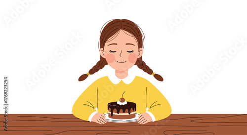 A young girl with braids sits at a wooden table, smiling with closed eyes, eagerly anticipating a delicious chocolate cake placed before her.