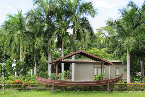 Palm Trees and Green Grass at the Thande Riverside Hotel in Bagan, Myanmar