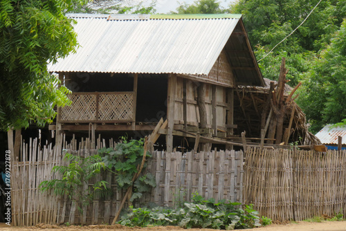 A traditional Burmese village with thatched houses in Bagan in Myanmar