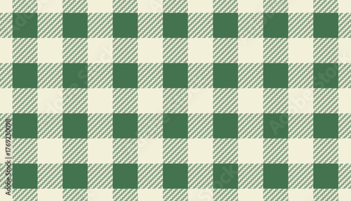Green and beige gingham seamless pattern. Classic checkered tablecloth background.