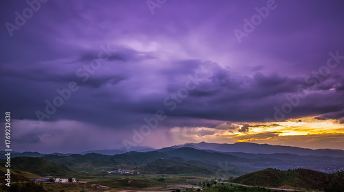 midgard. Dark purple storm clouds gathering before rainfall, dramatic sky formation, natural weather phenomenon. travel magazines, destination branding, designed for travel destination branding.