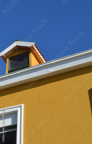 Yellow Dutch Colonial House in the Caribbean