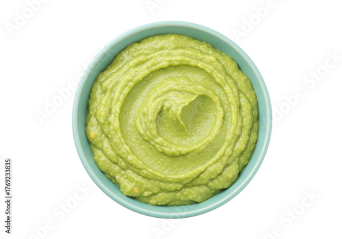 Quadro su tela Isolated green guacamole swirl in bowl, fresh avocado dip served as appetizer, h