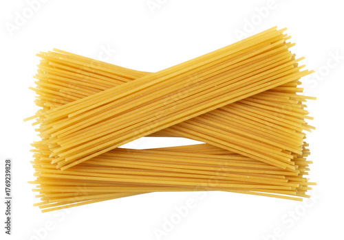 Fototapeta Isolated heap of dry uncooked spaghetti ready to be cooked for making pasta dish