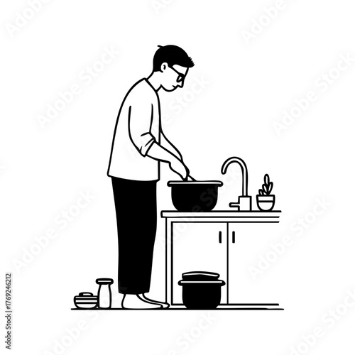 Man washing dishes at kitchen sink, representing daily routine, cleanliness, and domestic life.
