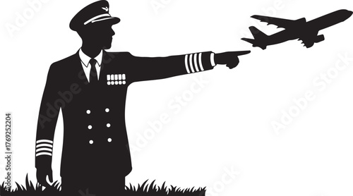 Black silhouette of airline pilot in uniform pointing at a flying airplane over grass
