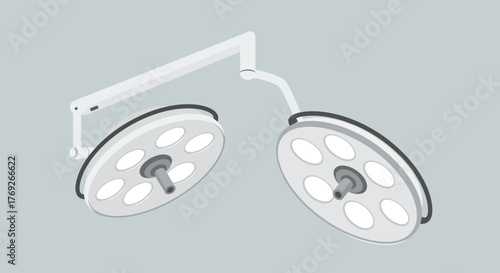 Two surgical lights attached to articulated arms against a gray background