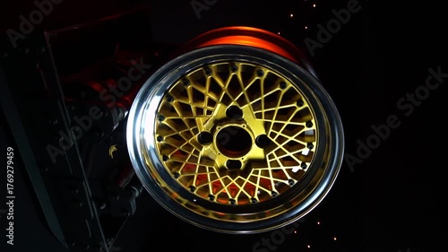 old retro stylish collapsible two-component wheels with a gold center and shiny rims for car tuning vertical video