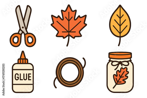 Set of essential autumn crafting materials including scissors, glue, twine, and fall leaves