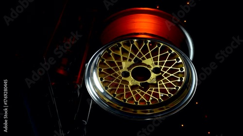 old retro stylish collapsible two-component wheels with a gold center and shiny rims for car tuning vertical video