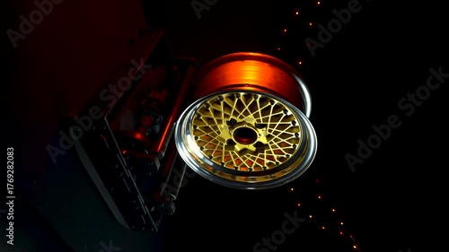 old retro stylish collapsible two-component wheels with a gold center and shiny rims for car tuning vertical video