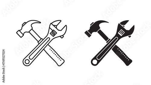 Crossed hammer and wrench tools in black and white on transparent background silhouette
