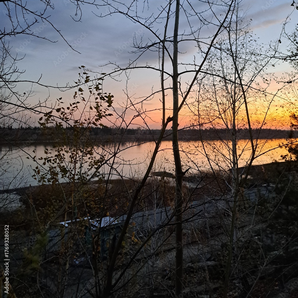 Obraz premium sunset on the river