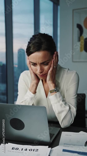Confused, business woman and laptop in office for finance mistake.
