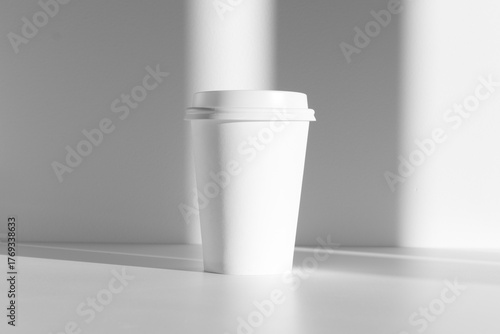 White coffee paper cup mockup with lid, shadow overlay, sunlight
