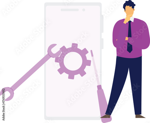 The boy is thinking about construction tools on mobile.