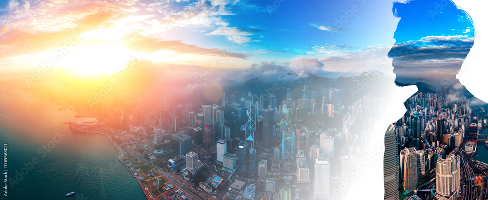 Fototapeta premium Double exposure shows a Hong Kong business person with a city and sky. The image combines urban life with ambition.