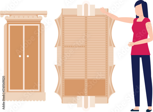 Girl is pointing a cupboard.