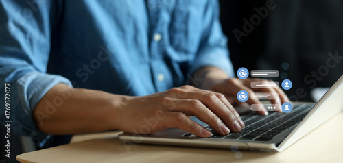 close up young man hand type question to ask and talk to AI robotic function to answer and help about system management for future technology and lifestyle concept