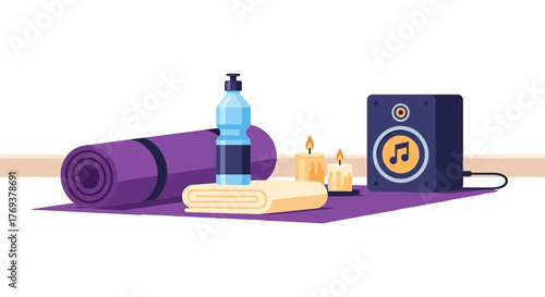 Yoga mat, water bottle, candles, and a speaker are arranged for a relaxing session.