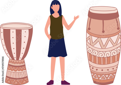 The girl is showing the drum instrument.