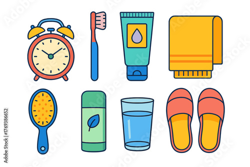 Colorful collection of personal care and morning routine items including alarm clock and toiletries