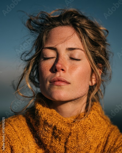 Woman taking a brief pause with eyes closed, expressing rest and inner calm.
