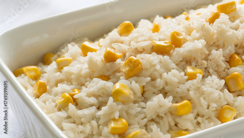 Enjoy rice and corn side dish in a white bowl a simple yet delightful meal any occasion