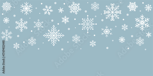 White snowflakes on light blue background. Gentle winter snowfall for Christmas and New Year design. Minimal frosty seasonal backdrop. Vector illustratio
