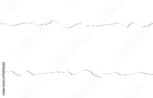 Abstract textured black torn paper strip with rough jagged edges on a clean white background creating a dramatic contrast and visual divide