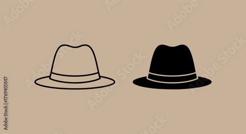 Two fedora hats one black and one beige on a neutral background