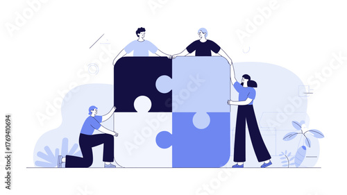 Diverse team of four people collaborating to assemble a large four piece puzzle symbolizing teamwork and shared goals