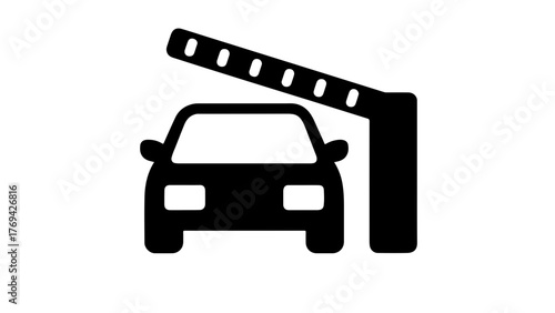 Car approaching a raised barrier gate