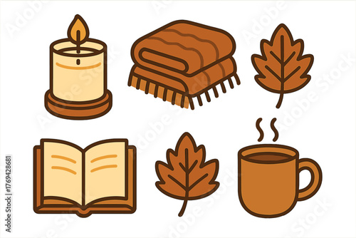 Cozy autumn set with lit candle warm blanket open book and steaming mug