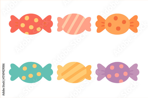 Assortment of sweet treats in colorful wrappers featuring polka dots and stripes