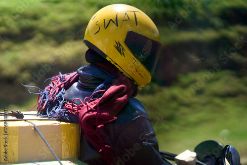 Kiambu County, Kenya - October 13th 2025 - Man driving motorbike