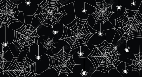 A spooky seamless pattern of white spider webs with hanging spiders against a black background, perfect for Halloween decorations.