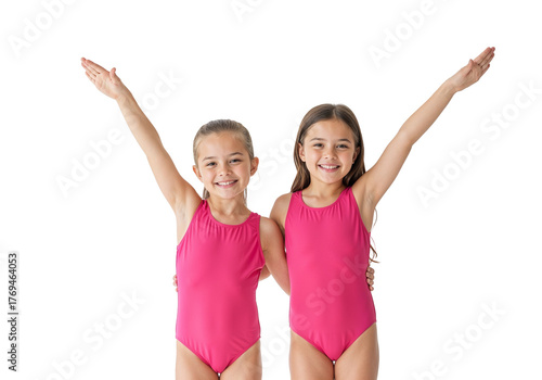 Two Smiling Children in Pink Swimsuits on White Background