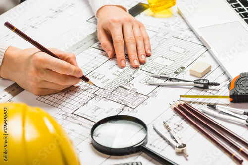 architect with blueprints