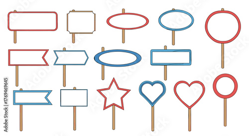 Diverse set of empty sign boards on wooden sticks, featuring red and blue frames in different geometric and decorative shapes for text.