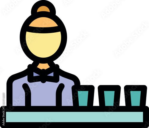 Bartender arranging glasses on counter, preparing for cocktail service in a bar or restaurant
