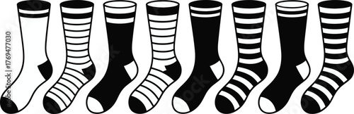 Variety of Stylish Black and White Socks with Stripes and Solid Patterns Illustration